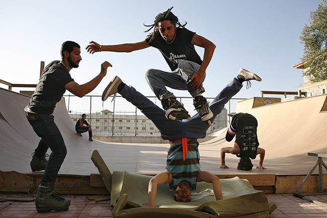 Ala'a, Sajed, Obeyda and Eihab rehearse tricks at the ramp. “Qalqilya is a little religious and conservative so some things are prohibited but people are getting more and more used to us” Sajed Abu Ulbeh. Qalqilya, Palestine
