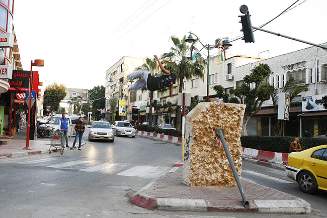 Einhab performs on the streets. Qalqilya, Palestine